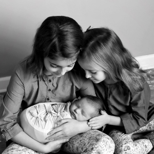 newborn with siblings photo