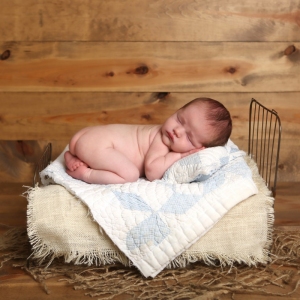 newborn-baby-in-bed