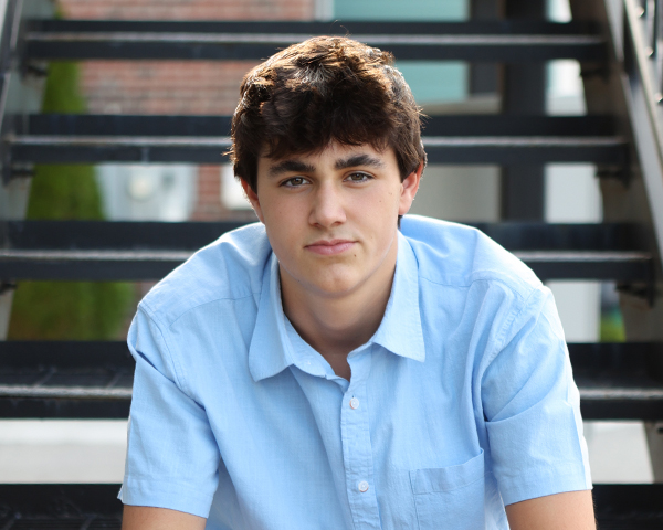 senior picture boy sitting on stairs