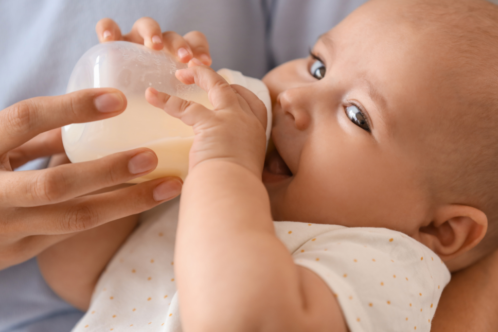 baby drinking from bottle