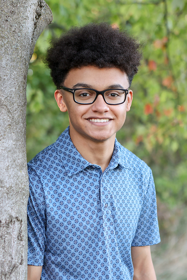boy posing for senior pictures at Japanese Garden in Carmel