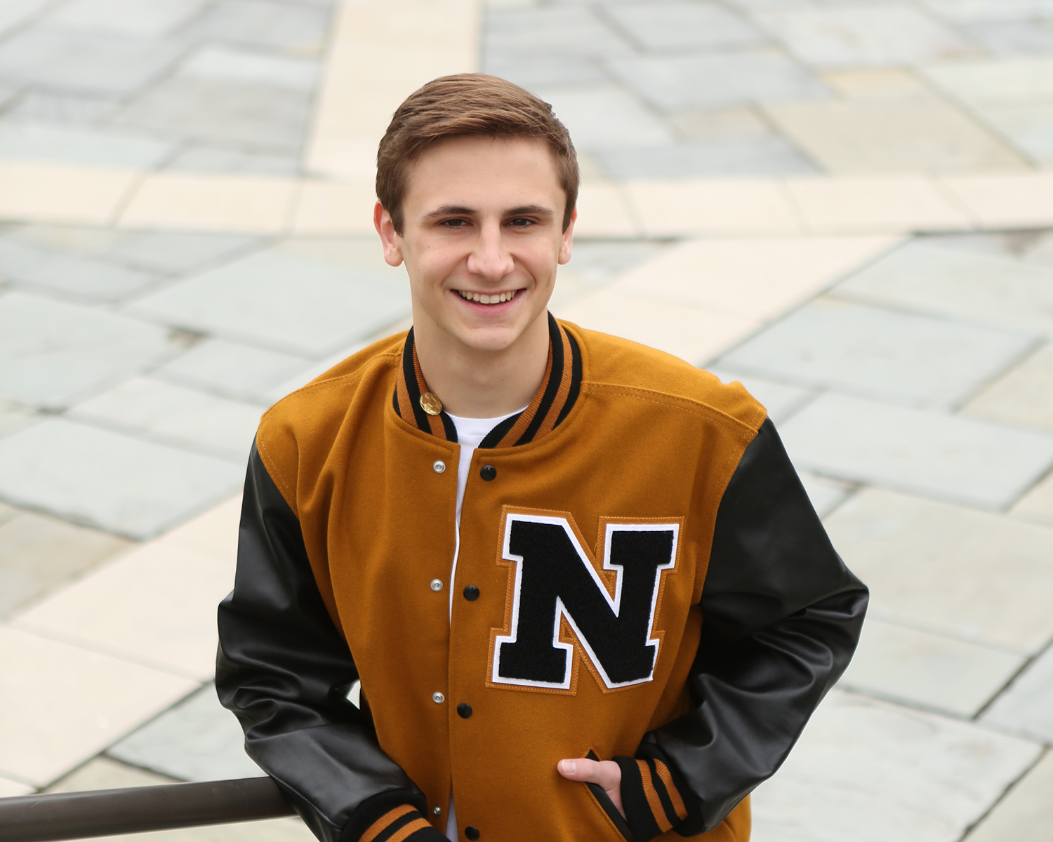 senior boy poses for senior portrait session in Noblesville Indiana